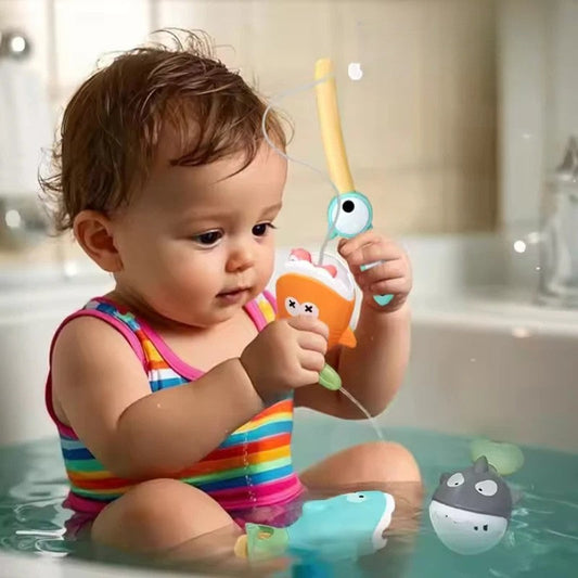 Toddler happily playing bathtub fishing game with magnetic rod and colorful floating fish toys