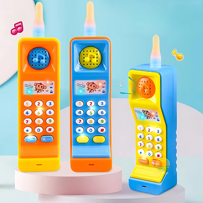 Toddler holding interactive musical pretend play phone toy with lights, learning sounds