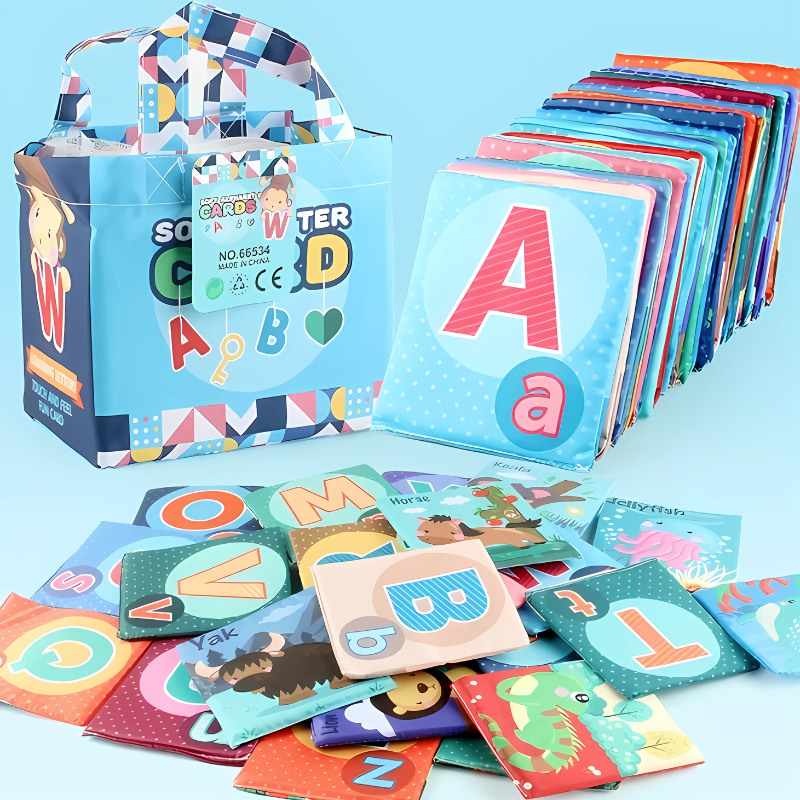 Toddler holding soft alphabet learning cards, engaging in preschool letter recognition and fine motor skill practice.