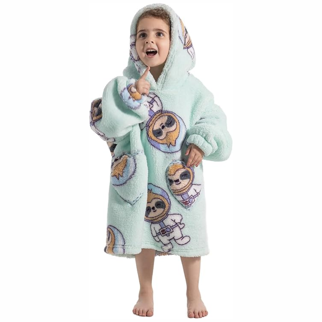 Toddler reading in a hooded blanket with sleeves & pockets, soft Sherpa fleece, ultimate cozy wrap