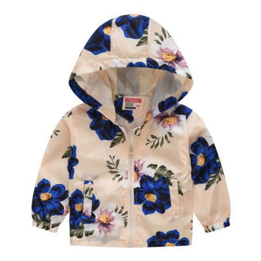 Toddler in a colorful floral hooded windbreaker jacket playing outdoors, boys and girls spring outerwear.