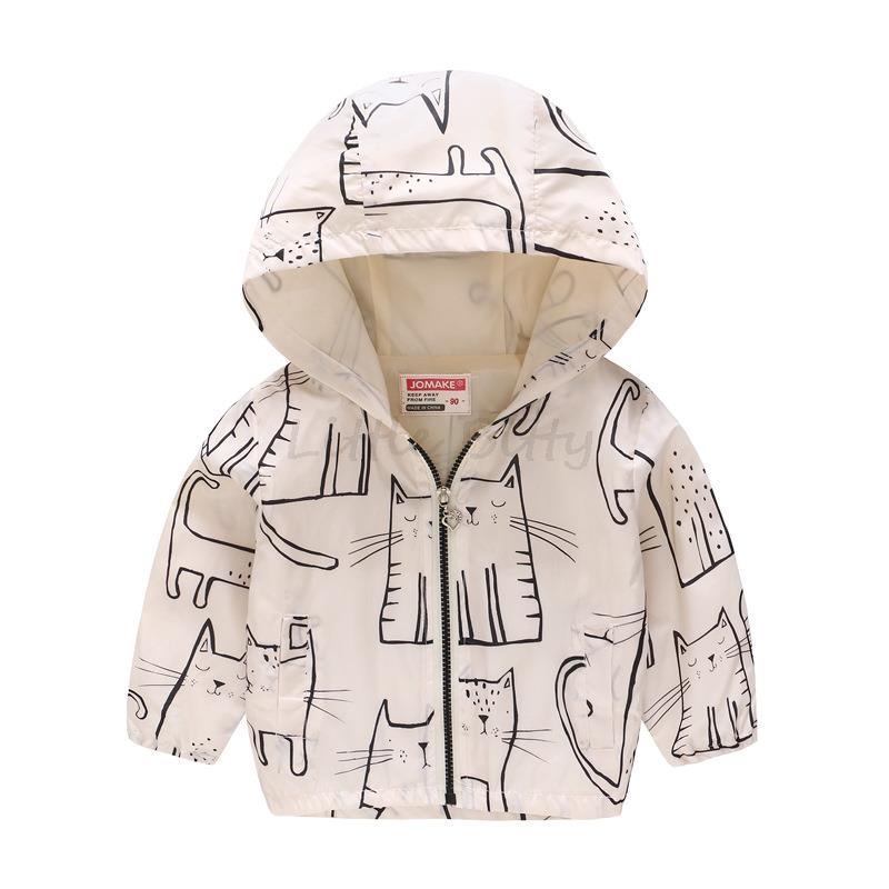 Close-up of the floral pattern on a kids' hooded windbreaker jacket, perfect for fall playwear.