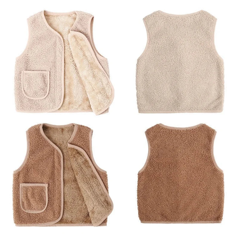 Warm kids lambswool vest in a neutral color, open over a long-sleeve, ideal for winter outdoor play.