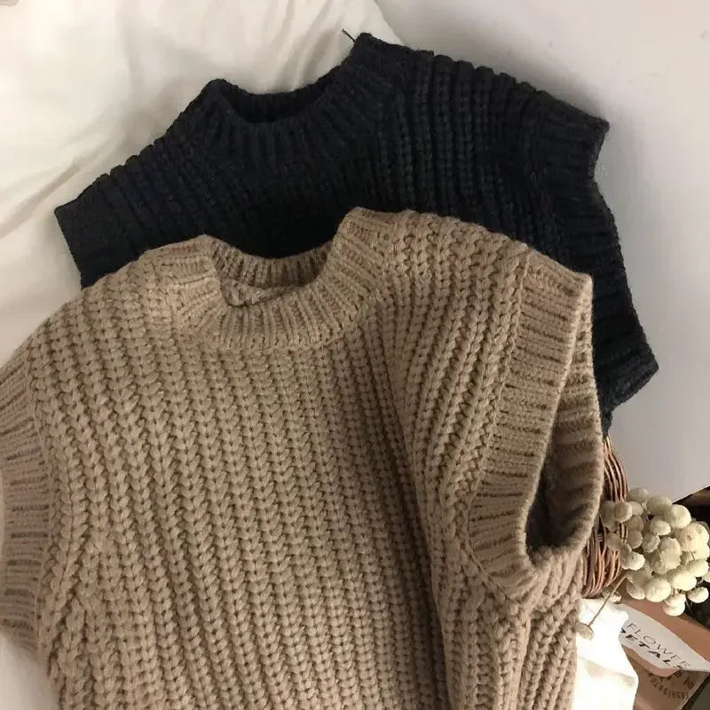 Unisex knitted sweater for toddlers, designed for comfort and warmth during autumn months.