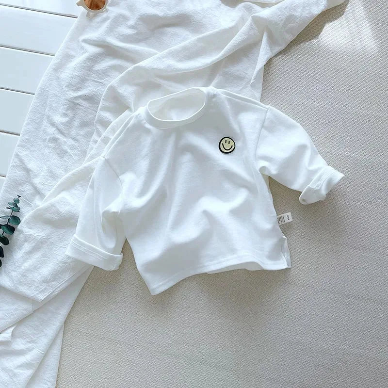 Kids' striped long sleeve top made from 100% cotton, a versatile and casual piece for toddlers.