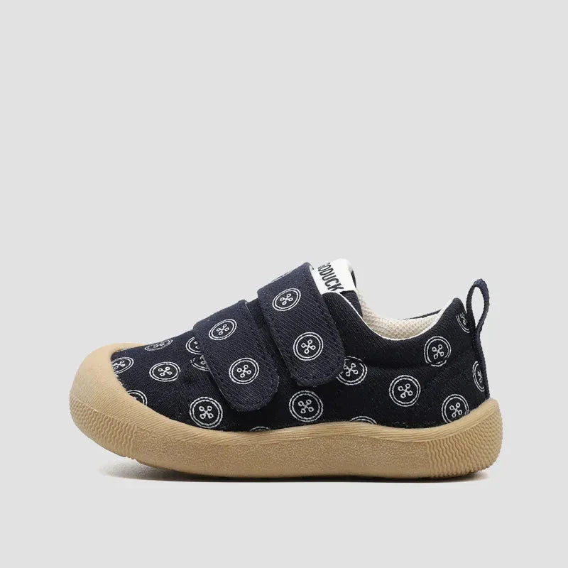 Detailed sole view of a toddler sneaker, showing the durable non-slip rubber for safety.
