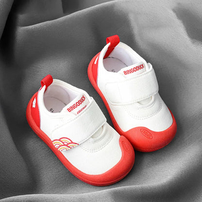 Assortment of vibrant canvas shoes for kids, all with breathable material and secure fastenings.