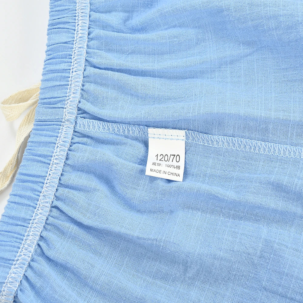 Group of colorful cotton-linen shorts for toddlers, showcasing summer fashion.