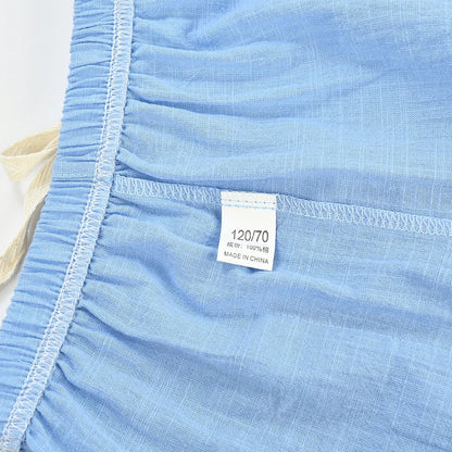 Group of colorful cotton-linen shorts for toddlers, showcasing summer fashion.