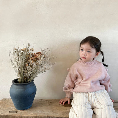 Kids' fashion: an arrangement of cotton harem pants, highlighting their versatility and comfort.
