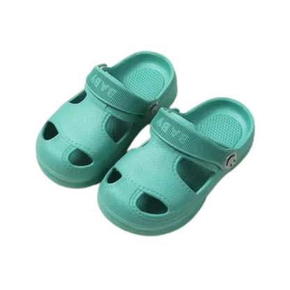 Side view of pink kids' play sandals, highlighting the comfortable design and non-slip sole