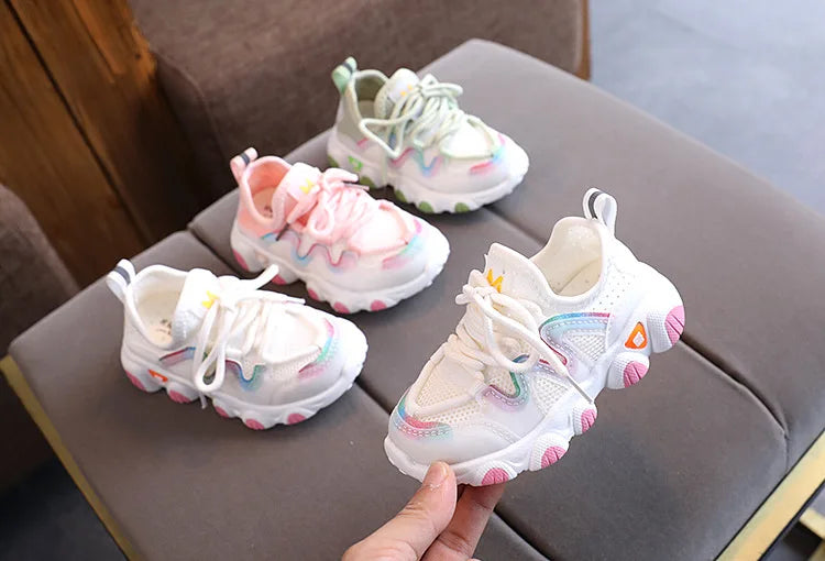 Dynamic shot of toddler kids breathable athletic sneakers, ready for running and jumping fun