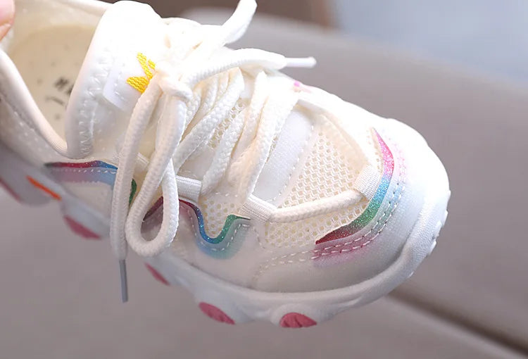 Kids breathable athletic sneakers with grip sole, ensuring stability for playful toddlers' adventures