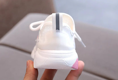 Toddler kids breathable athletic sneakers, side profile, showing flexible sole and striped upper design