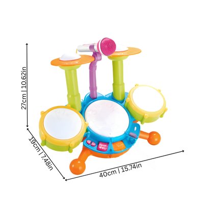 Close-up of a kids drum set, toddler toy, with drumsticks and a microphone for creative musical play