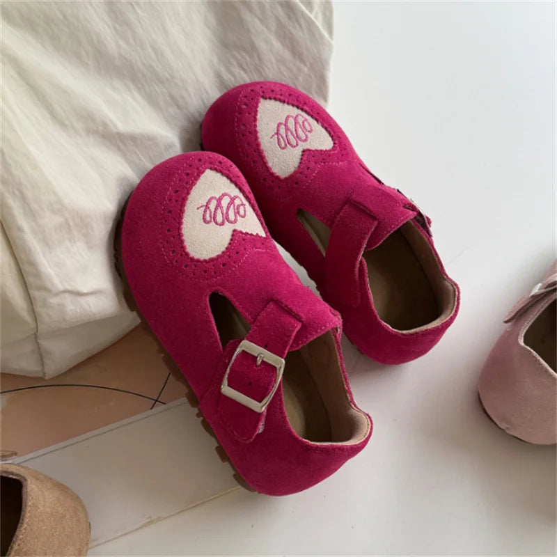 Toddler leather barefoot shoes with soft soles and velcro closure, ideal for natural walking.