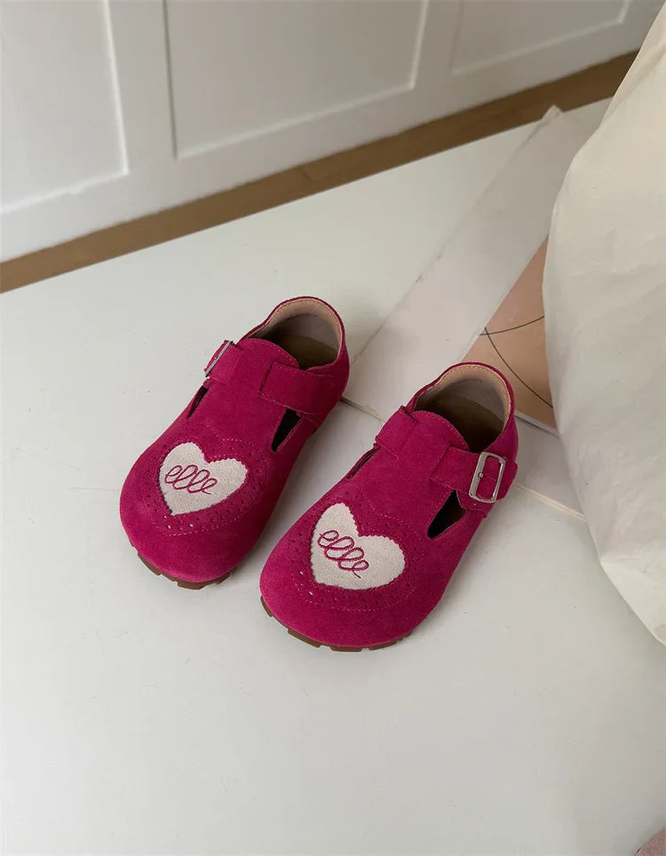 Detail of the soft, non-slip sole on children's leather barefoot walking shoes.