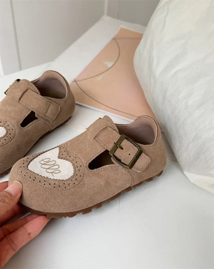 Back view of toddler's leather barefoot shoes, soft sole, showcasing quality craftsmanship.