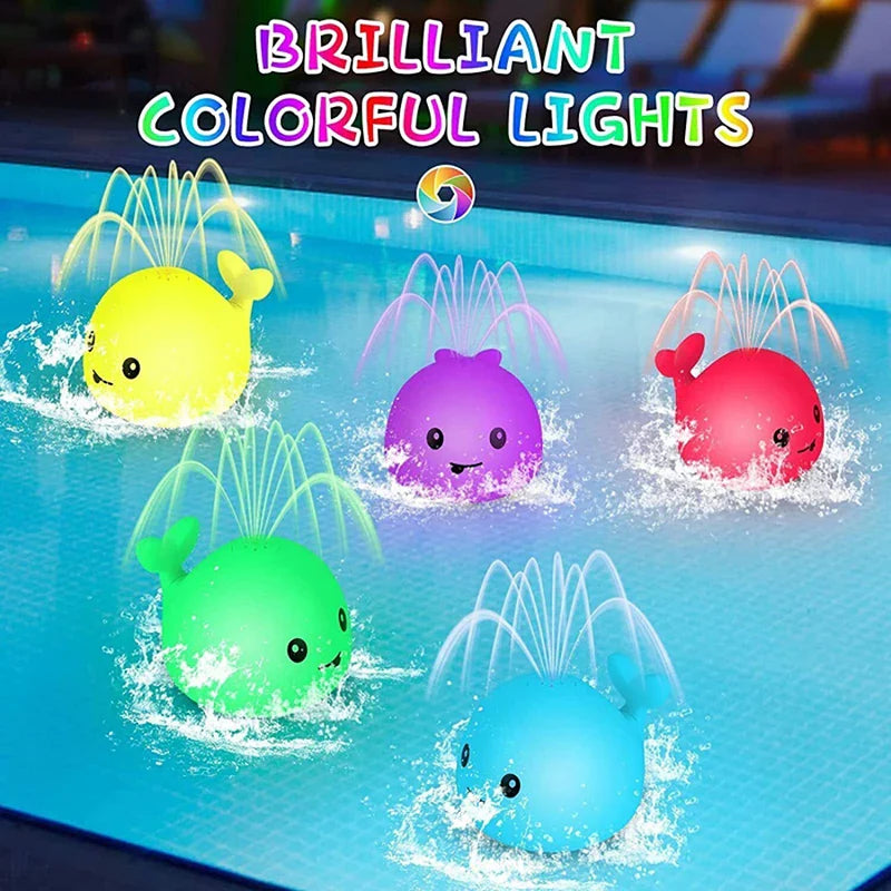 Toddler bath toy, light-up whale design with automatic sprinkler, engaging water play for kids