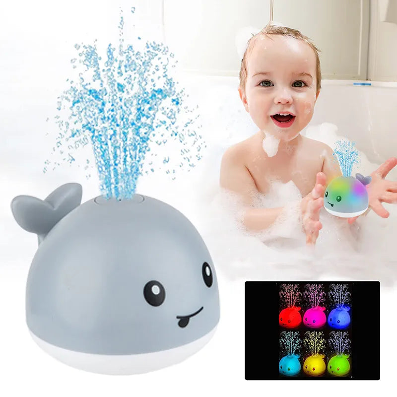 Light-up whale baby bath toy, automatic sprinkler feature, enhancing toddler and newborn bath fun