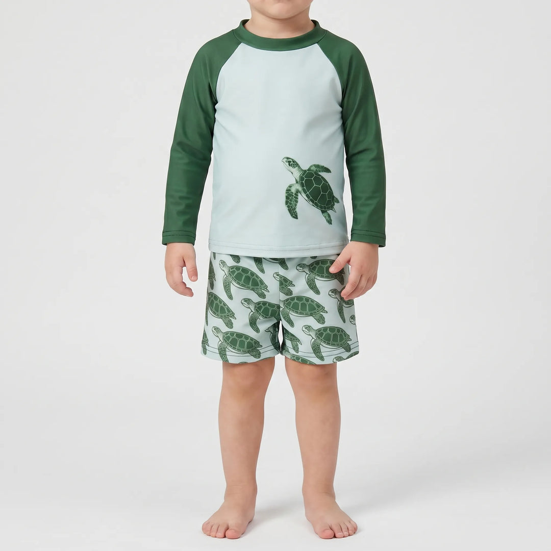 Playful tortoise print toddler long-sleeve rash guard swim set. Essential UPF 50+ sun protection beachwear for summer kids.