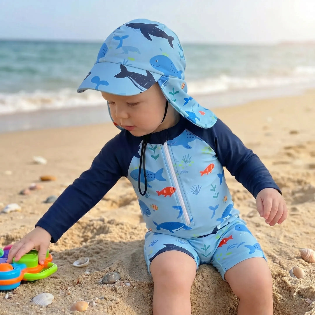 Toddler long-sleeve swim romper & hat set. Ideal beachwear and pool clothes with sun protection. Marine print.