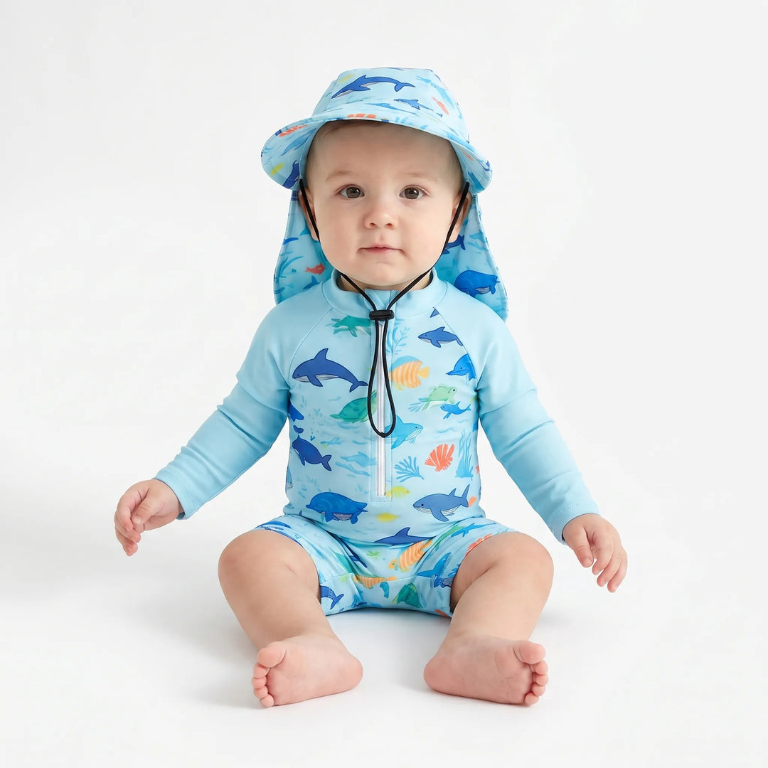 Two-piece long-sleeve baby swim romper & matching hat for superior UV sun protection. Cute marine animal print.