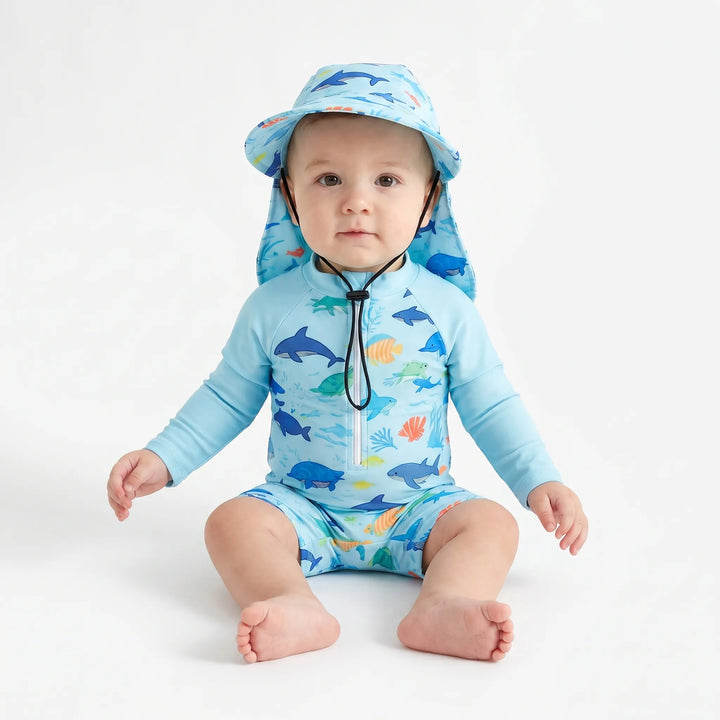 Two-piece long-sleeve baby swim romper & matching hat for superior UV sun protection. Cute marine animal print.