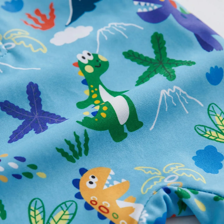 Comfortable long-sleeve toddler swimsuit and sun protection hat. Stylish kids' beachwear for summer fashion.