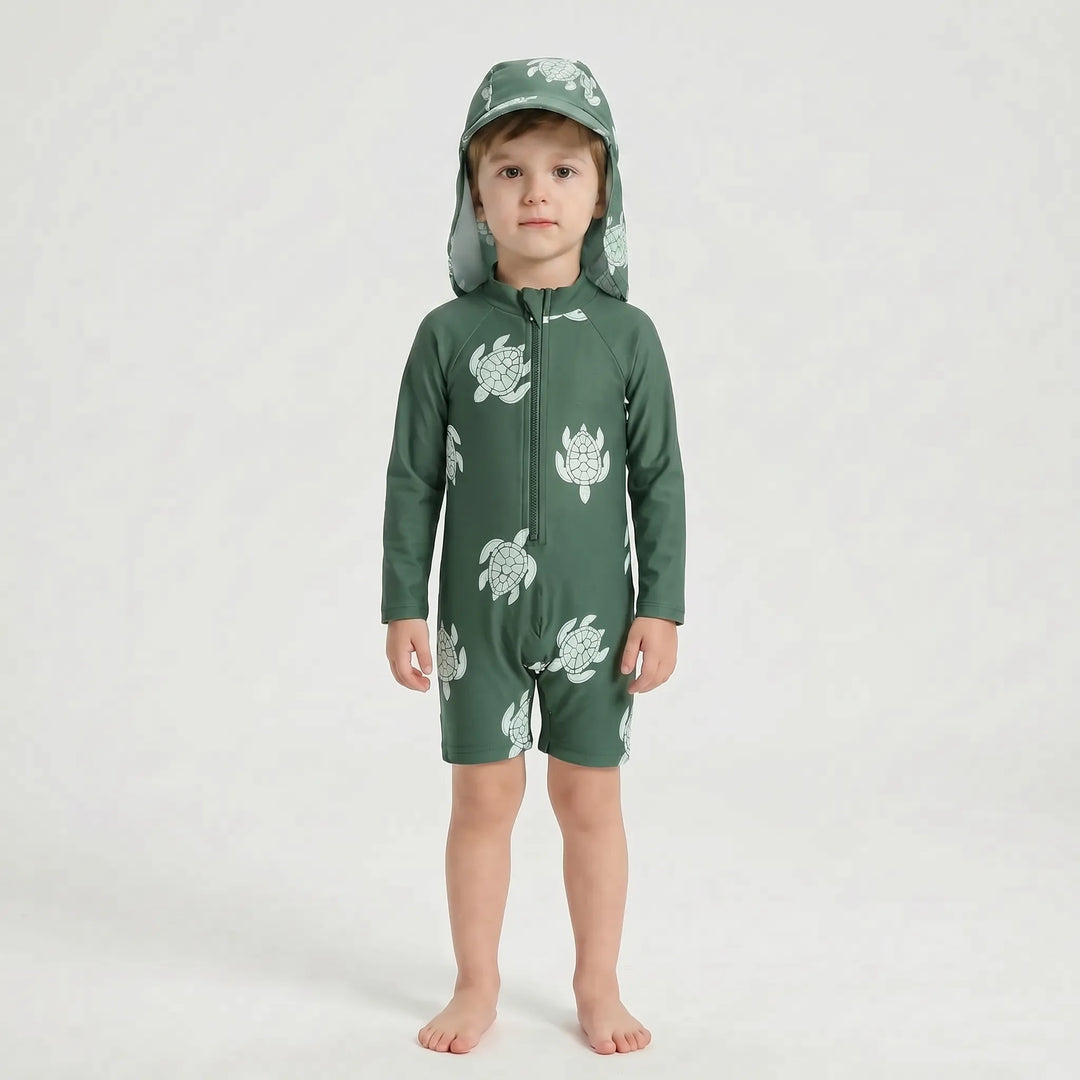 One-piece long-sleeve toddler swimsuit with sun protection, includes matching swim hat for kids' beachwear.