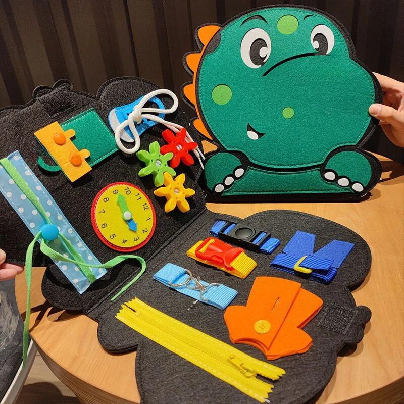 Toddler Montessori sensory board with dinosaur theme, promoting fine motor skills & educational play for kids