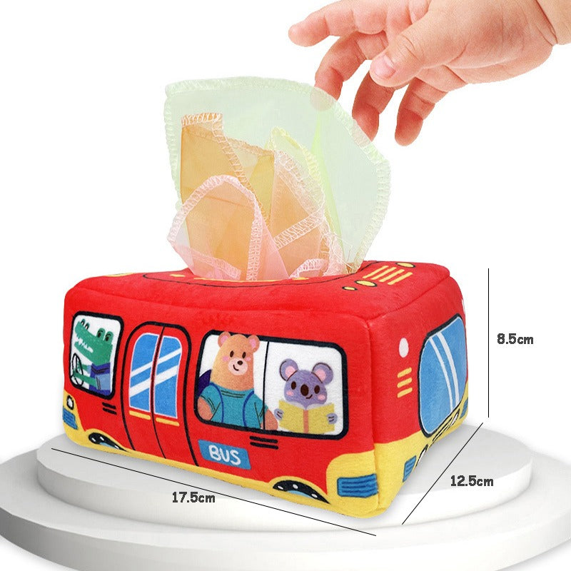 Baby pulling soft, crinkly scarves from Montessori fine motor skill tissue box toy