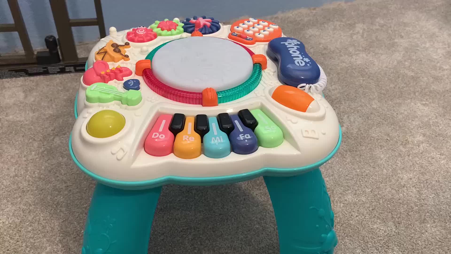 Overhead view of a Toddler Musical Play Table with different instruments and interactive features