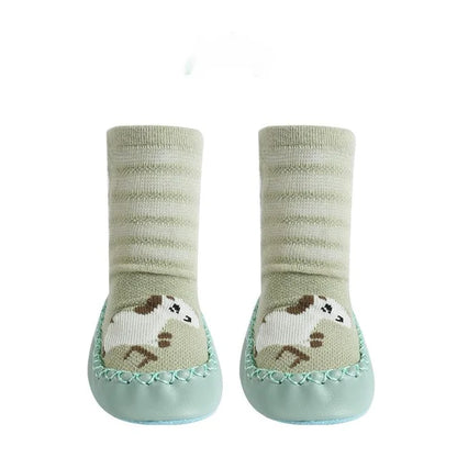 Close-up of the non-slip sole on a toddler animal sock, safe footwear for baby