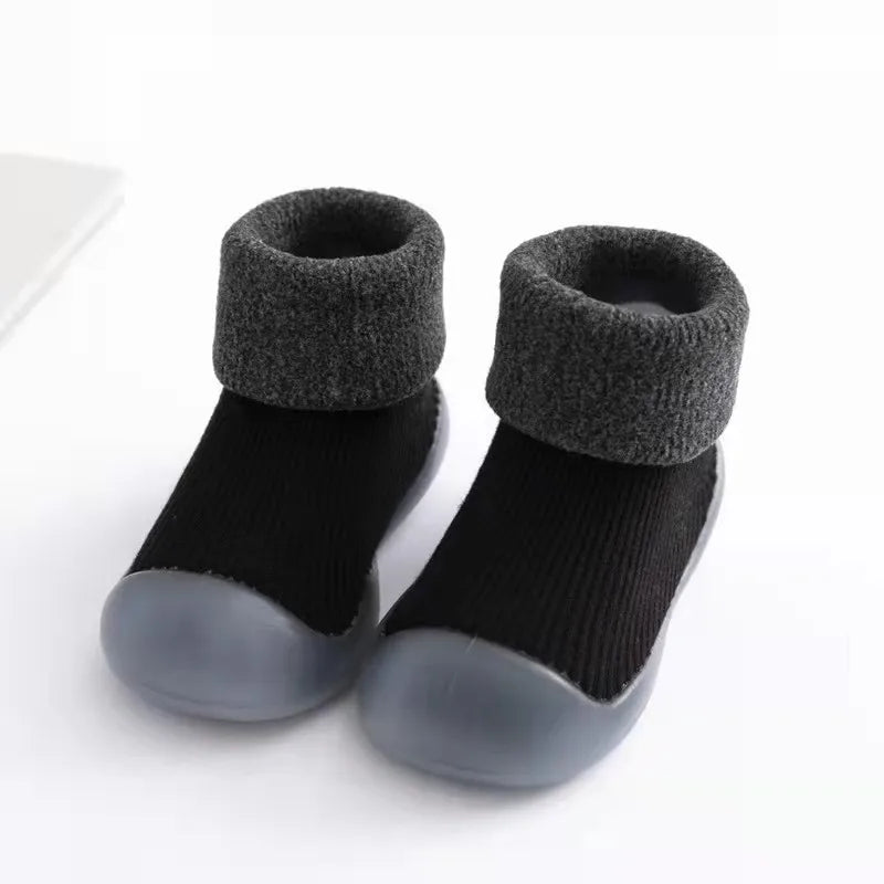 Close-up of soft knit fabric of baby grip sock shoes for ultimate comfort
