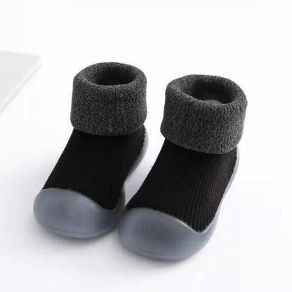 Close-up of soft knit fabric of baby grip sock shoes for ultimate comfort