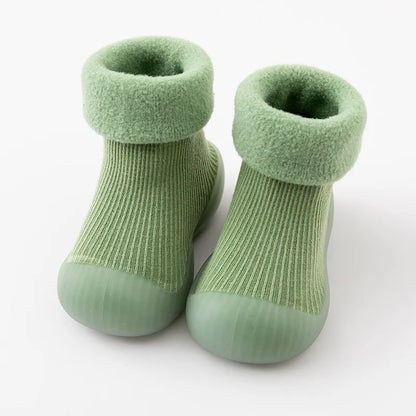 Toddler non-slip grip sock shoes in a fun animal print, soft sole design