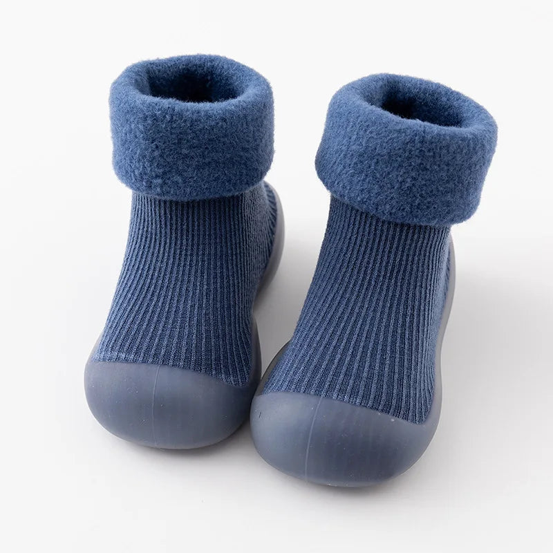 Cozy baby winter socks that double as non-slip first walker shoes