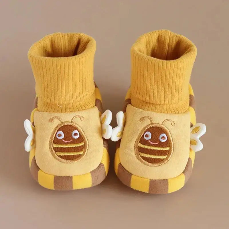 Close-up of pink toddler indoor shoes with non-slip sole, ideal for baby footwear