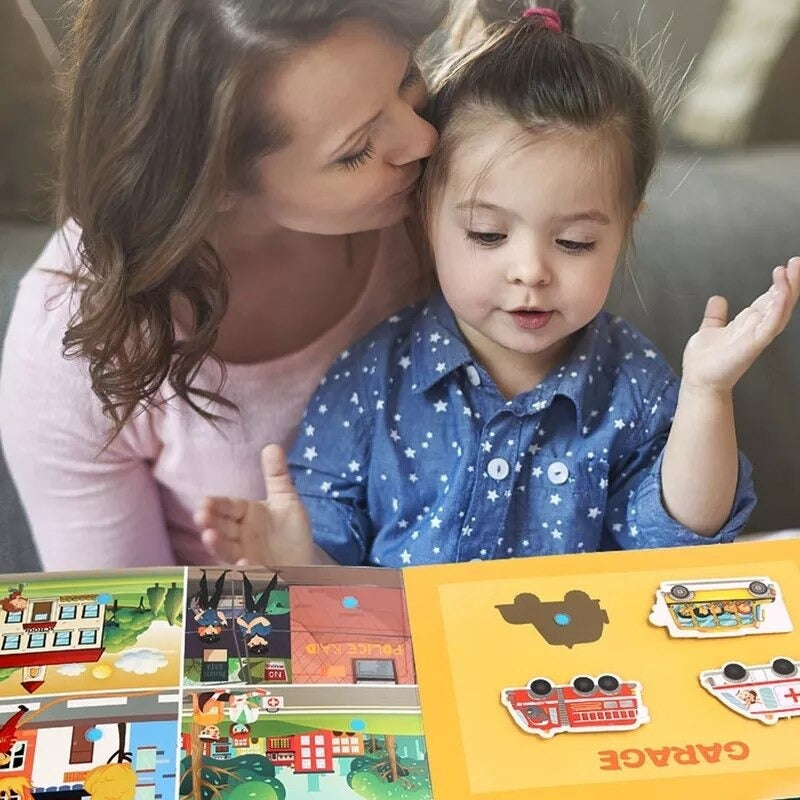 Child's hands exploring a felt shapes page in a quiet book, promoting preschool motor skills & learning.