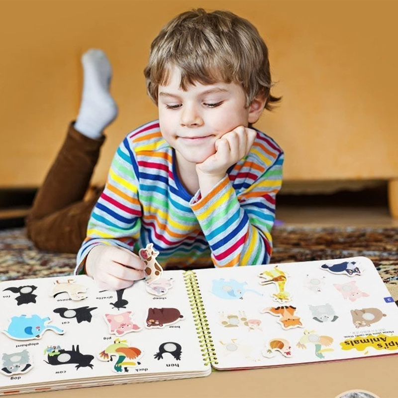 Closeup of a lacing shoe activity within a quiet book, enhancing fine motor skills for young children.