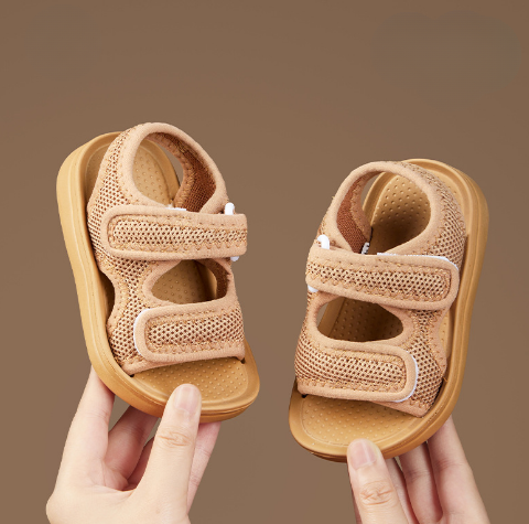 Close-up of kids' summer sandals showing soft sole and supportive arch for comfortable outdoor wear