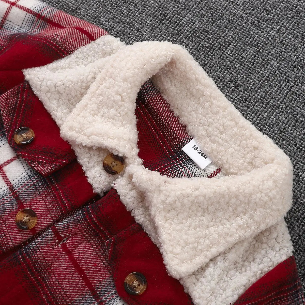 Toddler's cozy checkered jacket, a durable and warm outerwear option for children