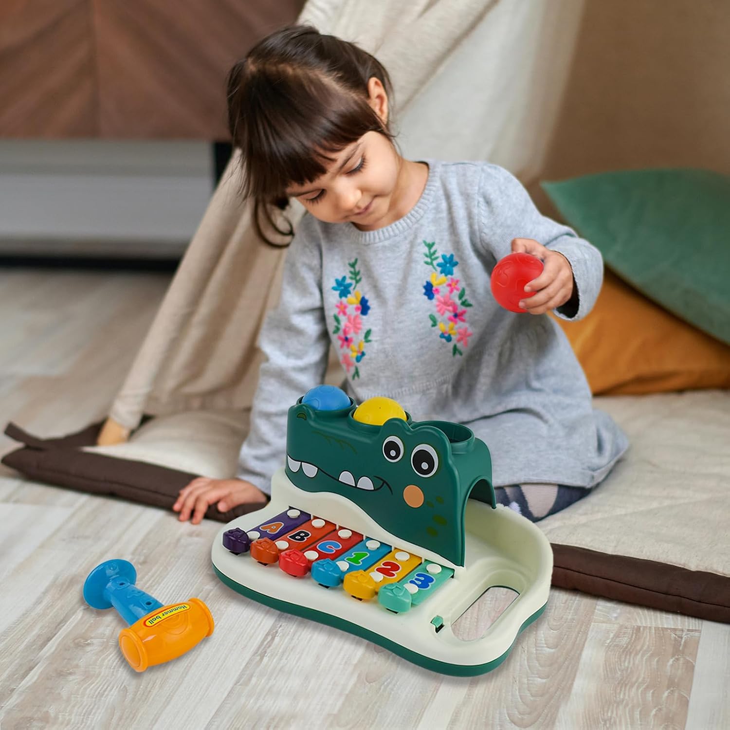 Close-up of a Kids Musical Hammer Xylophone Toy, showcasing bright keys for early developmental play.
