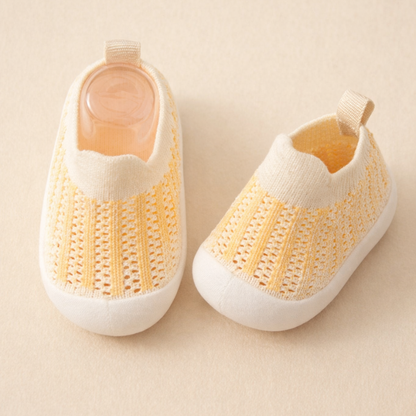A pair of comfortable and flexible soft sole non-slip sneakers for active kids