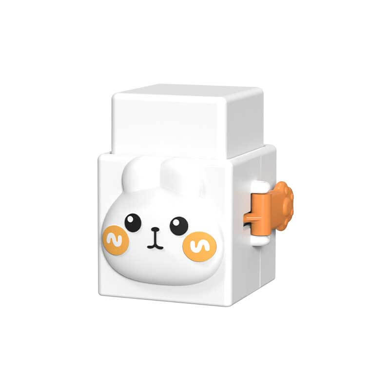 Toddler grasping an animal stacking block, showcasing development of hand-eye coordination.