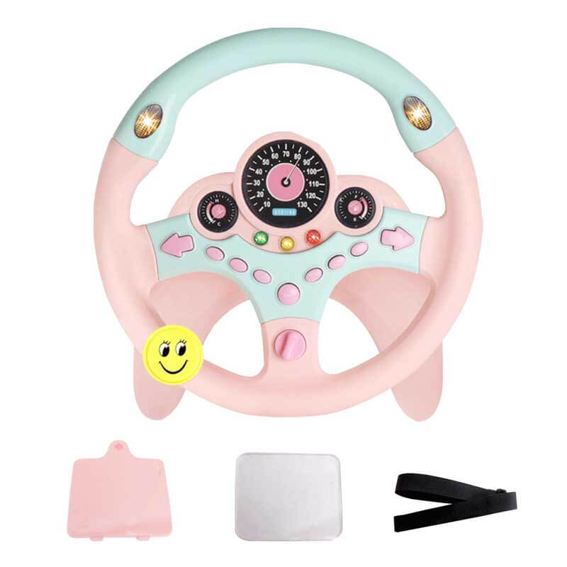 Toddler playing with interactive driving steering wheel toy with lights and sounds