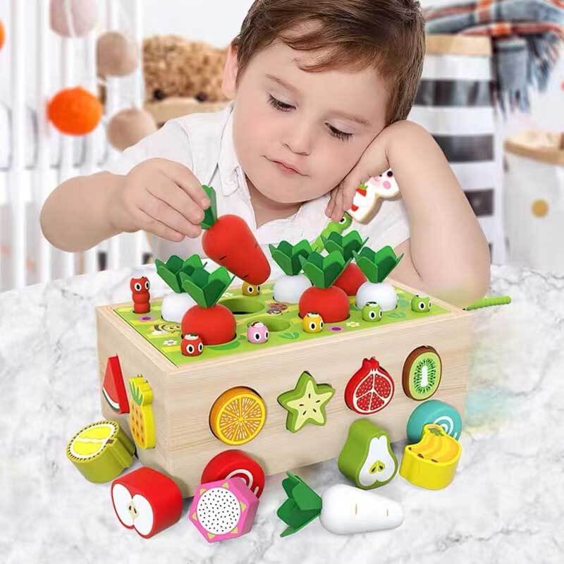 Toddler playing with wooden farm animals activity set, developing fine motor skills and learning.