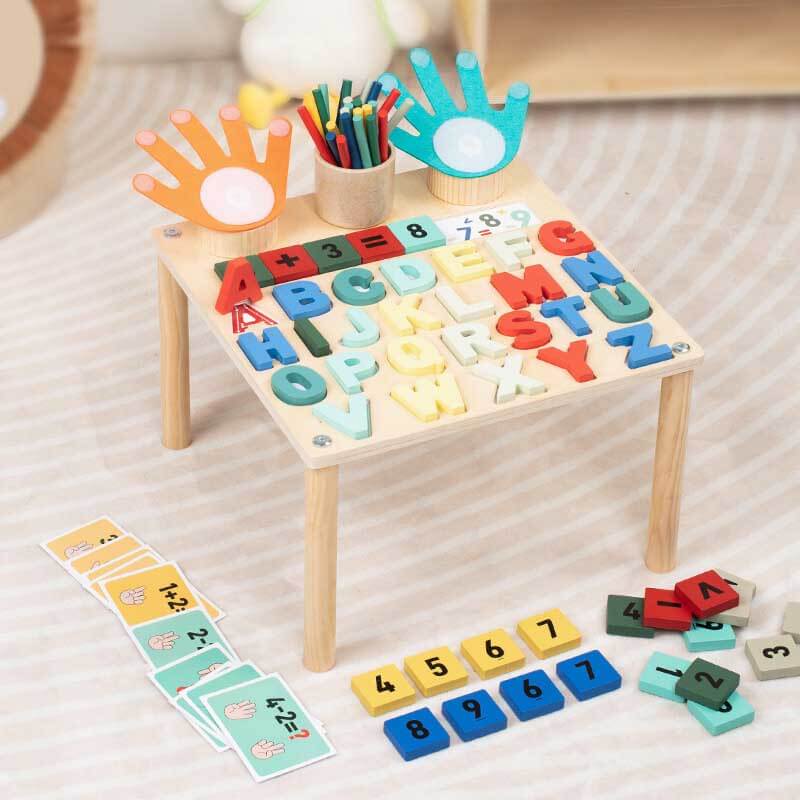 Wooden interactive learning table for children, showcasing educational games and activities.