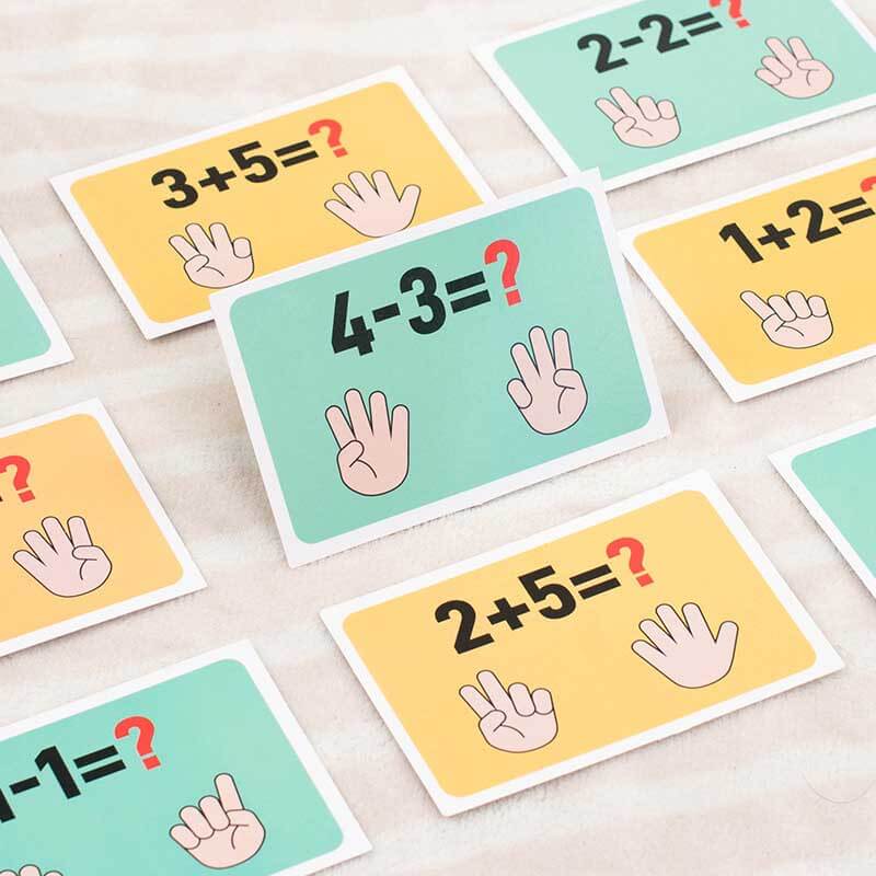 Close-up of a child's hand engaging with a wooden educational toy activity table.